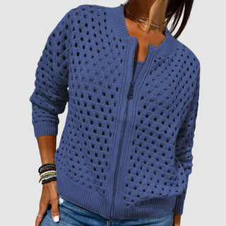 Gilet zippé en tricot ajouré bleu, zip central, poignets et bas côtelés.