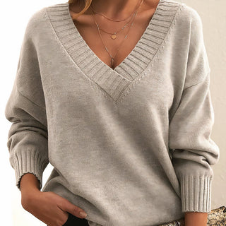 Pull femme beige en tricot, col V côtelé, manches longues bouffantes et poignets côtelés