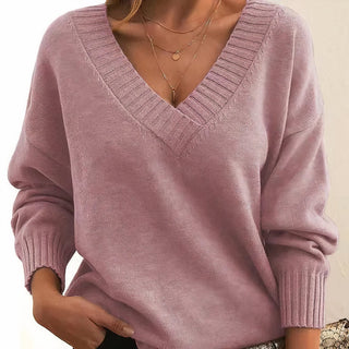 Pull femme rose en tricot, col V côtelé, manches longues bouffantes, poignets côtelés